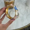 Design By Si Ebony armbånd med striber - Blå/lyserød/hvid/guld Clearance