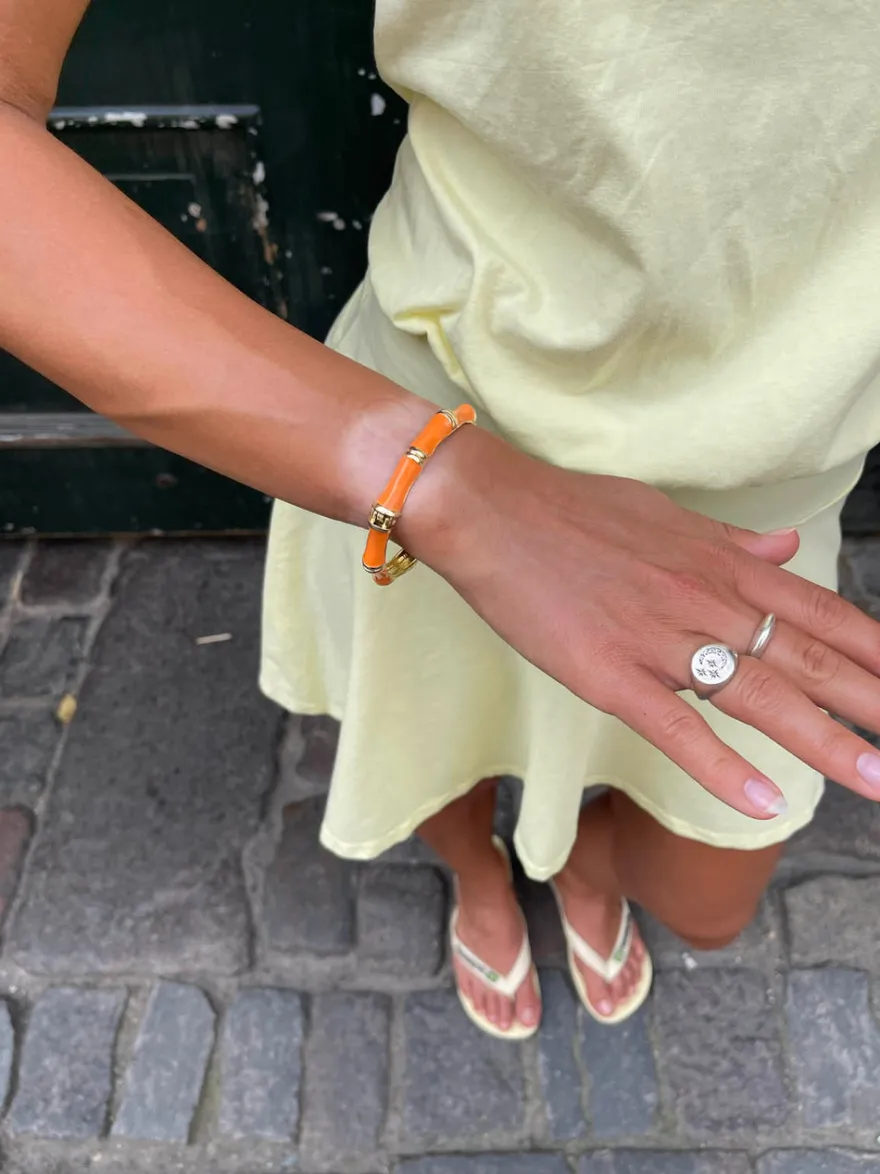 Design By Si Sola armbånd med striber - Orange/guld Clearance